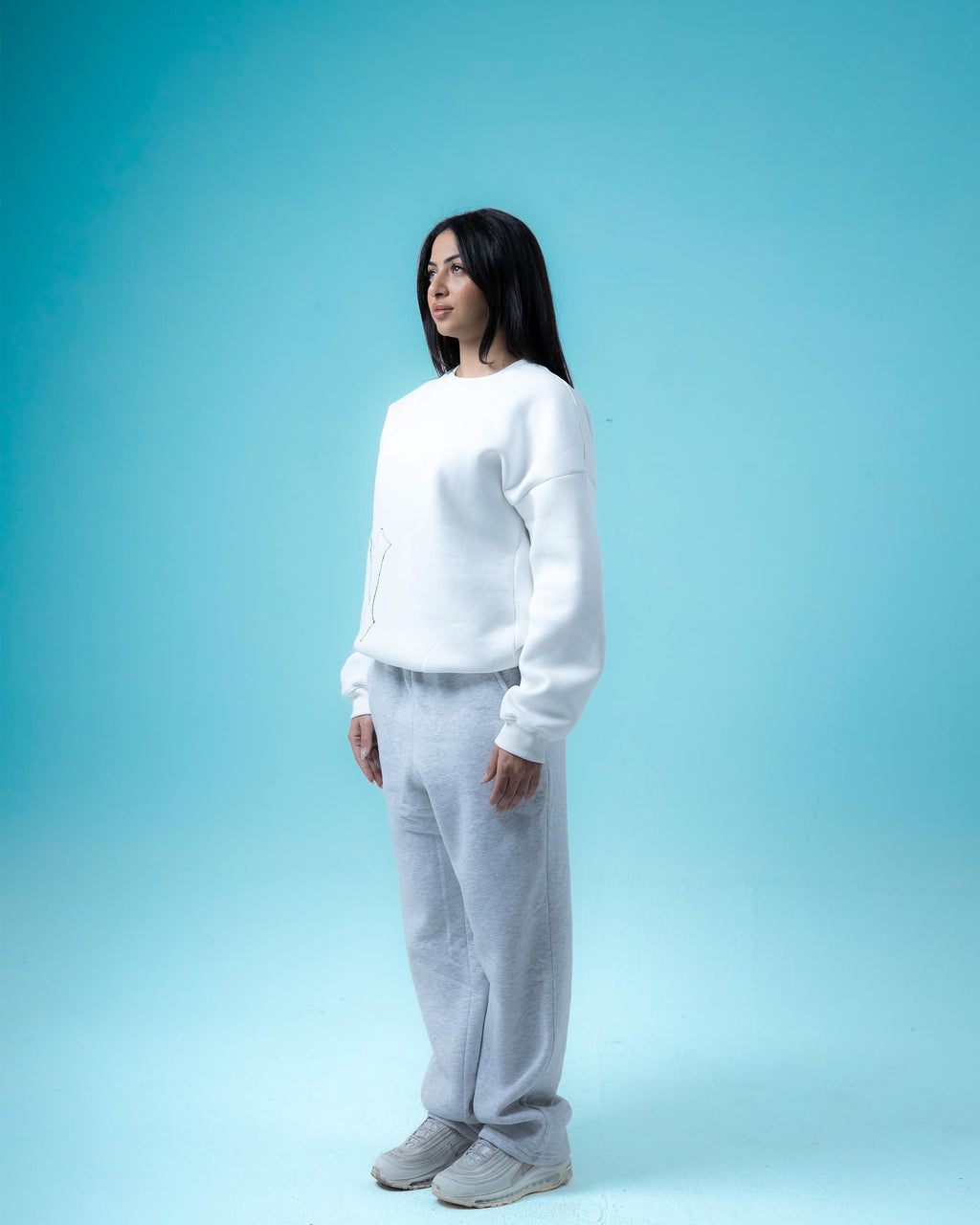 White Crewneck and Light Grey Pants