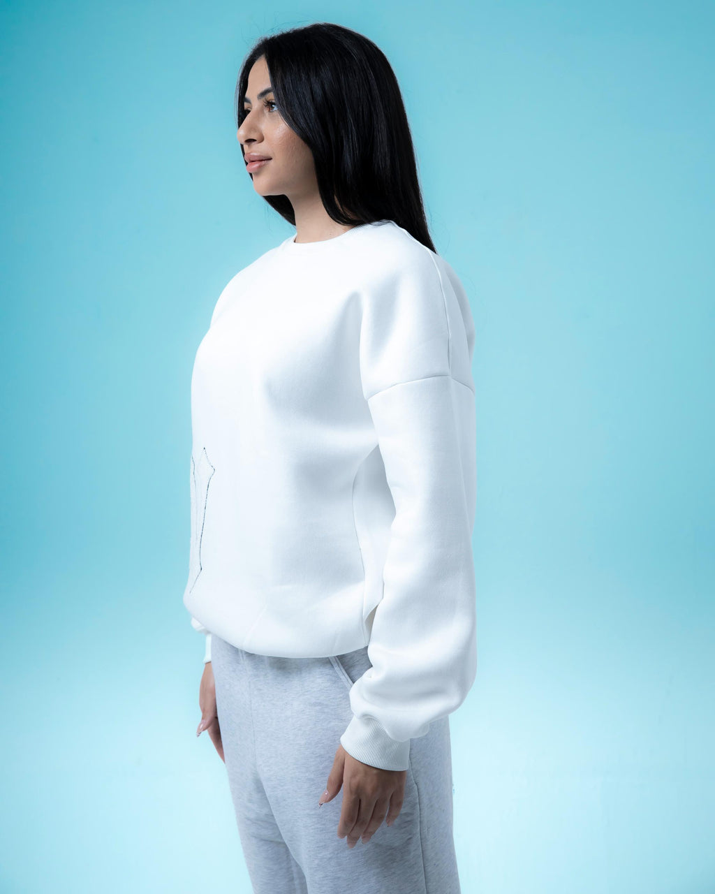 White Crewneck and Light Grey Pants